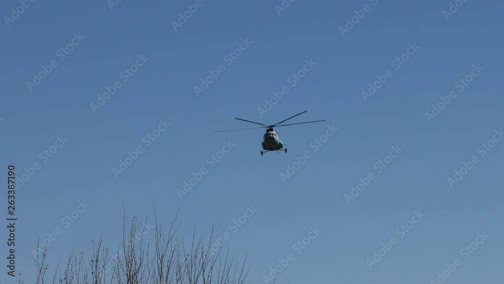 Helicopter flying in the sky. MI-8 Russian aircraft in flight. Helicopter flying in the sky. MI-8 Russian aircraft in flight.
