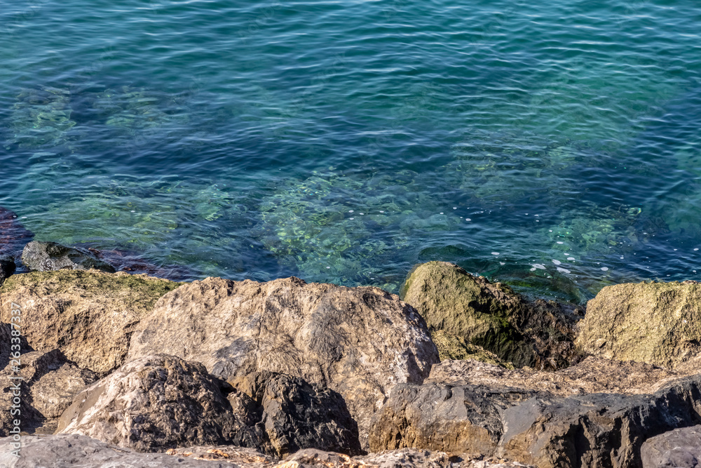 Seashore, consisting of large stones and boulders. Seashore, consisting of large stones and boulders.