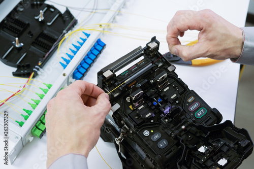 Foto Fiber Optic Splicing by fusion splicing machine