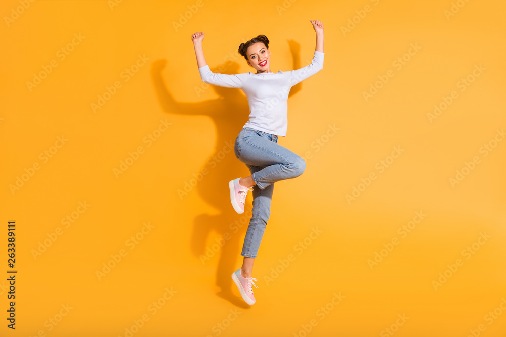 Full length body size view photo of pretty isolated charming youngster hipster screaming yeah celebrating victory in white pullover denim pink sneakers over colorful background