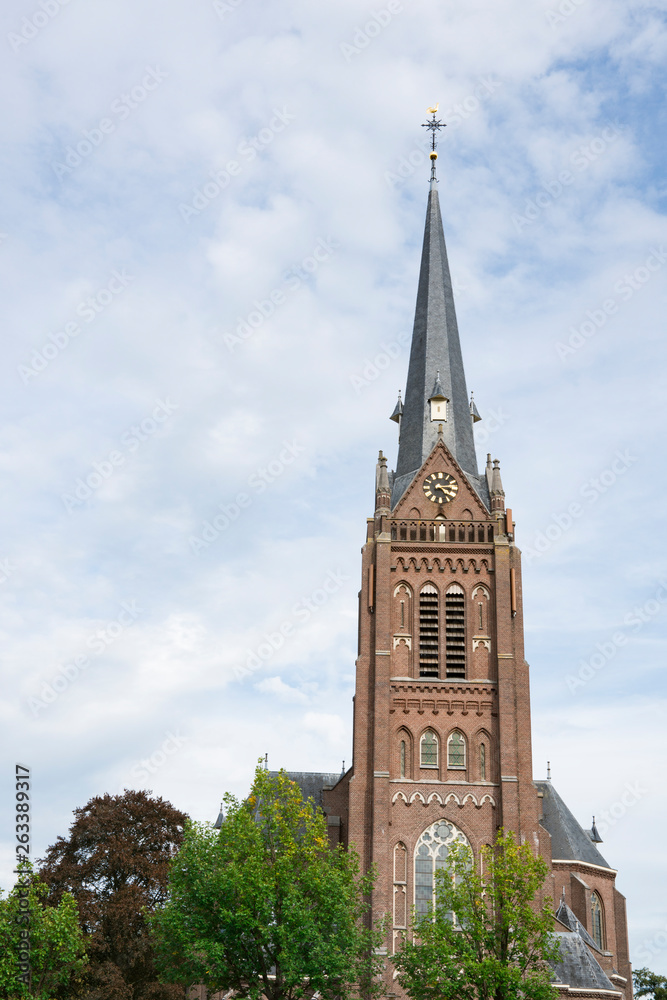 tower of Sint Lambertus Church in Haaren, The Netherlands. Space for text
