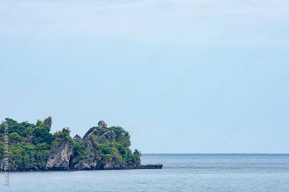 Wooden houses built on rocks in the koh Maphrao at Chumphon in Thailand. Wooden houses built on rocks in the koh Maphrao at Chumphon in Thailand.