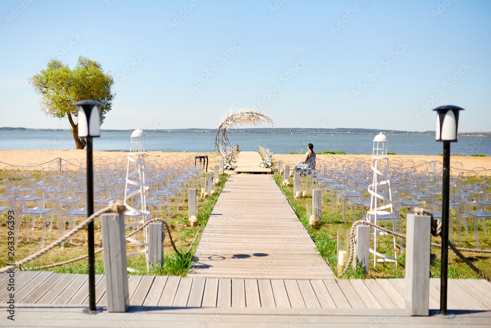 beautifully decorated outdoors ceremony area 