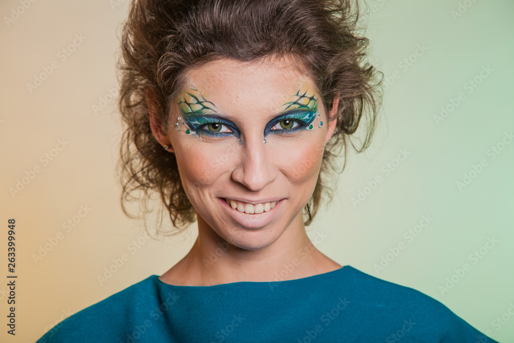 Bold image of a modern woman predator. Bright makeup women vamp. Bold image of a modern woman predator. Bright makeup women vamp.
