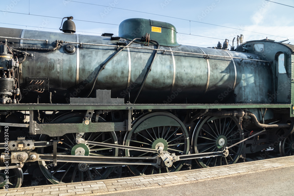 Naklejka premium Kouvola, Finland - April 18, 2019: Old steam train Ukko-Pekka on the station at morning.