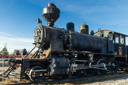 Kouvola, Finland - April 18, 2019: Old steam locomotive as an exhibit at the Kouvola railway station in Finland.