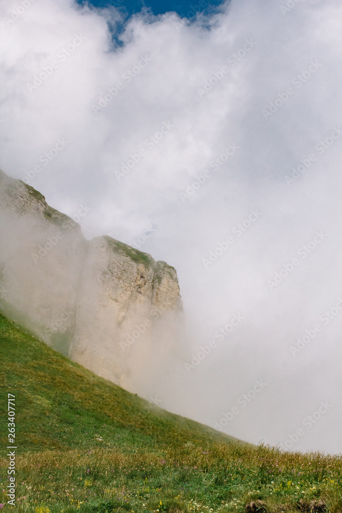 Beautiful background summer mountain landscape with clouds Beautiful background summer mountain landscape with clouds