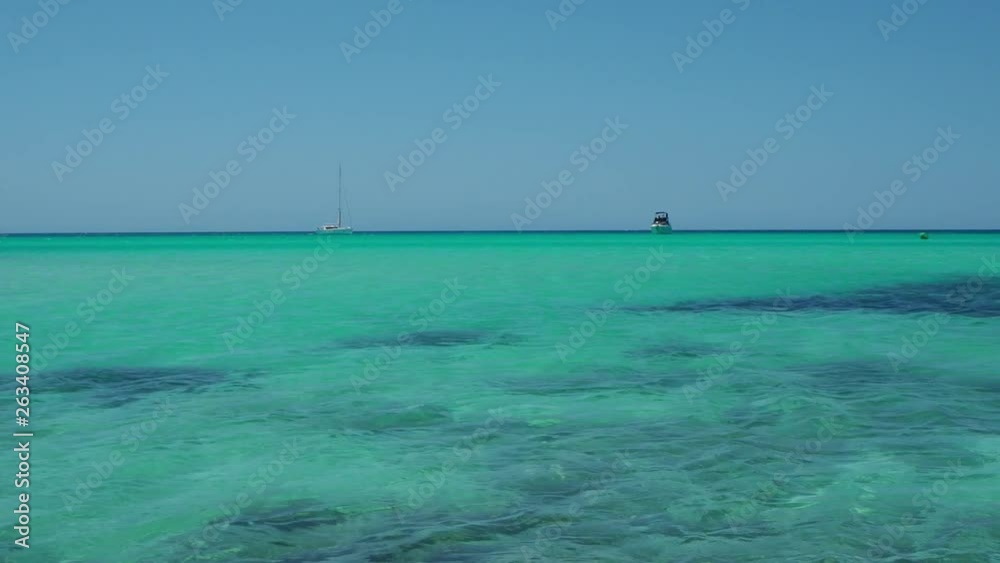 Colonia Sant Jordi, Spain. Amazing landscape of the charming beach Es Trenc. It has earned the reputation of Caribbean beach of Mallorca Colonia Sant Jordi, Spain. Amazing landscape of the charming beach Es Trenc. It has earned the reputation of Caribbean beach of Mallorca