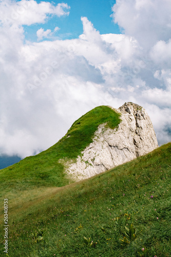 Beautiful summer mountain landscape with clouds and a sunny day. photo