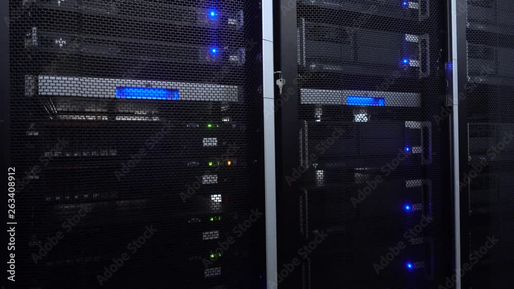Servers in data center. Servers racks close up in Modern data center. Cloud computing datacenter server room. Motion camera. Servers in data center. Servers racks close up in Modern data center. Cloud computing datacenter server room. Motion camera.