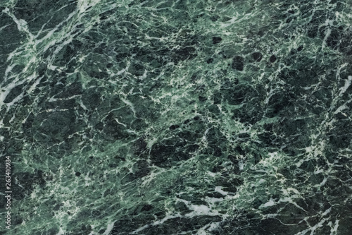The dark green marble. Facing stone. Texture