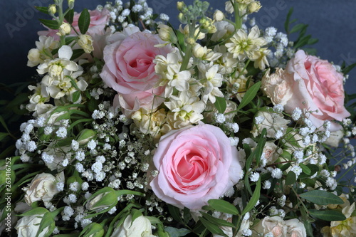 A large bouquet of different flowers. Several types of roses and other plants to decorate the bouquet. © f2014vad