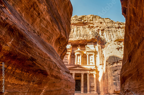 .incredible and breathtaking view of the Al-Khazneh treasury through the walls of the canyon al-Siq