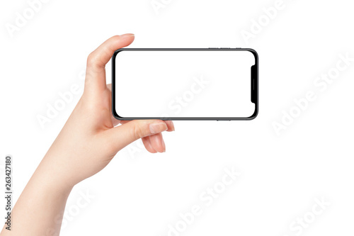 Female hand hold modern smartphone in horizontal position, isolated on white background. Mockup for presentation
