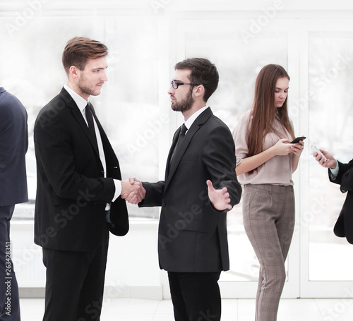 close up.welcome handshake of business people in the office