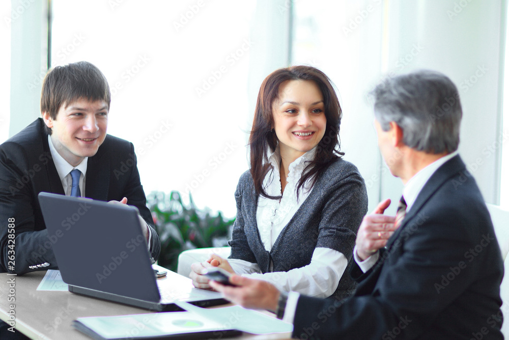 boss and staff in discussing the working paper