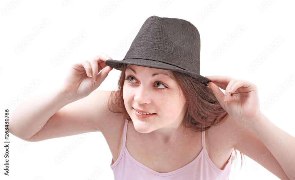 smiling young woman in black hat.isolated on a white smiling young woman in black hat.isolated on a white