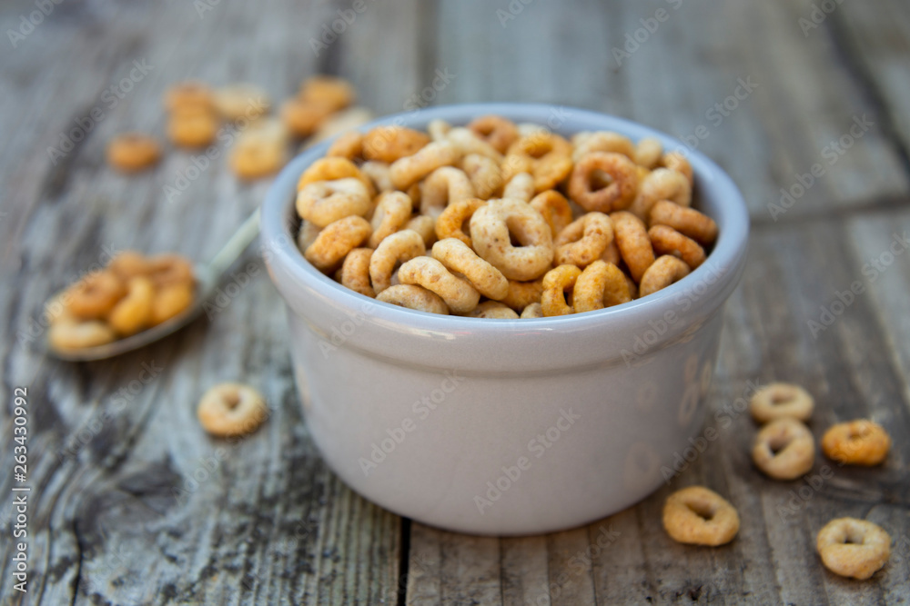 Healthy breakfast cereal rings in bowl. Good morning. A healthy breakfast. Dry muesli. Healthy breakfast cereal rings in bowl. Good morning. A healthy breakfast. Dry muesli.