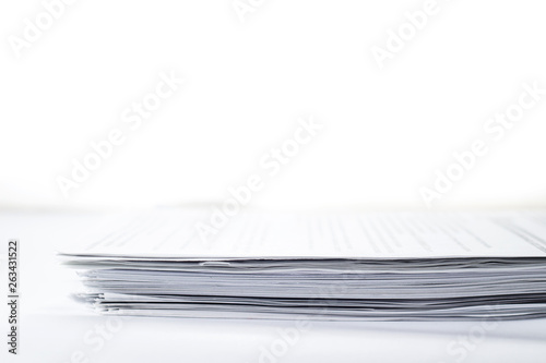 Canvastavla Close-up small stack of papers on white background with copy space, selective fo