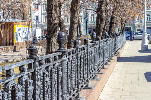 Wrought iron fence around the Park photo