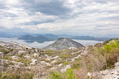 Lake Skadar - cloudy sky and the mountains. Montenegro. photo