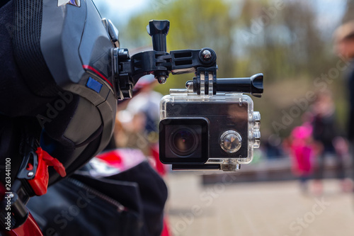 Action camera on a motorcycle rider's helmet photo