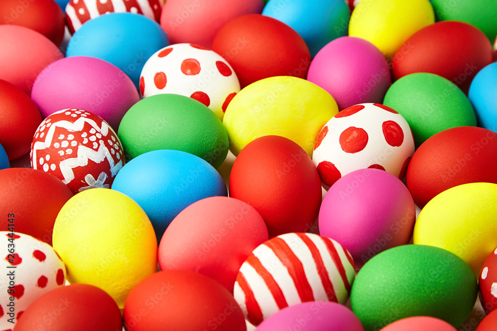 Colorful painted Easter eggs background. Christian holiday traditions. Traditional symbol. Ceremonial food Colorful painted Easter eggs background. Christian holiday traditions. Traditional symbol. Ceremonial food