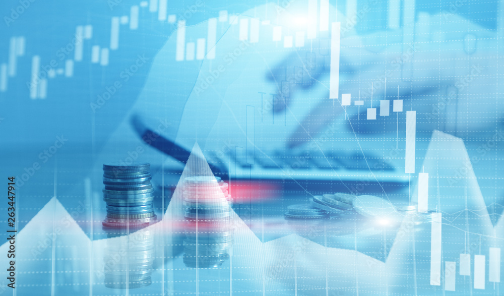 Financial graph chart and rows of coins with calculator. Financial graph chart and rows of coins with calculator.