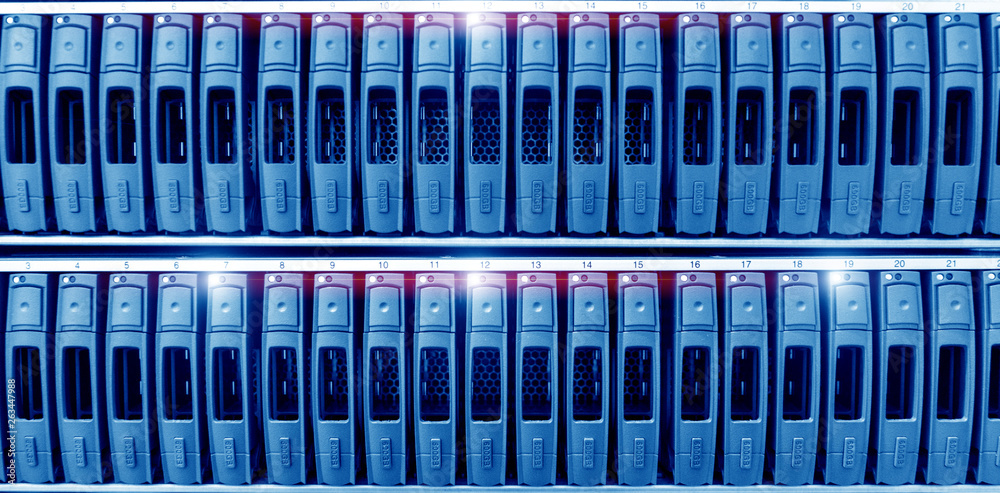 Server hard drives SATA in the data center server room. Disk storage array