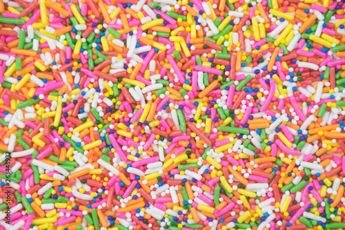 sprinkles background, sugar sprinkle dots, decoration for cake and bakery © surachet99