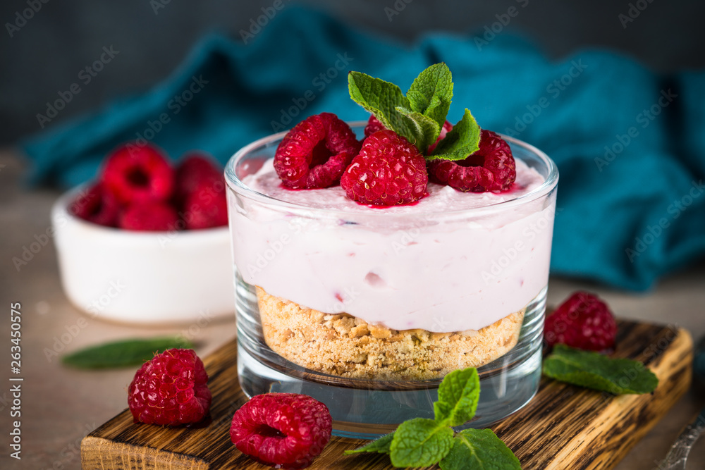 No baked cheesecake with raspberry in glass jar. No baked cheesecake with raspberry in glass jar.