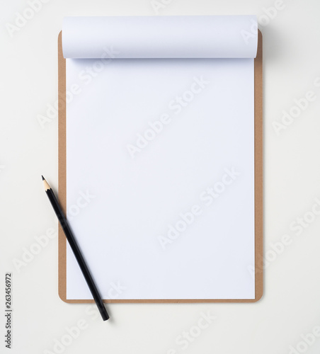 white paper on clipboard isolated on background