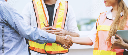 Engineer or architect handshake