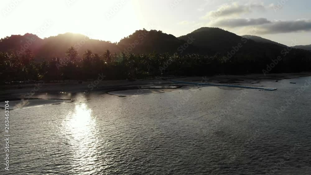 Aerial view tropical beach and sea landscape at sunset time Aerial view tropical beach and sea landscape at sunset time