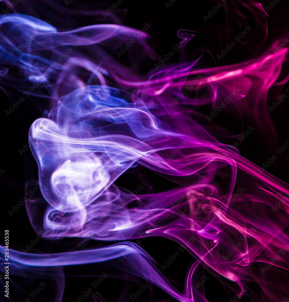 Fototapeta premium Colored smoke on black background