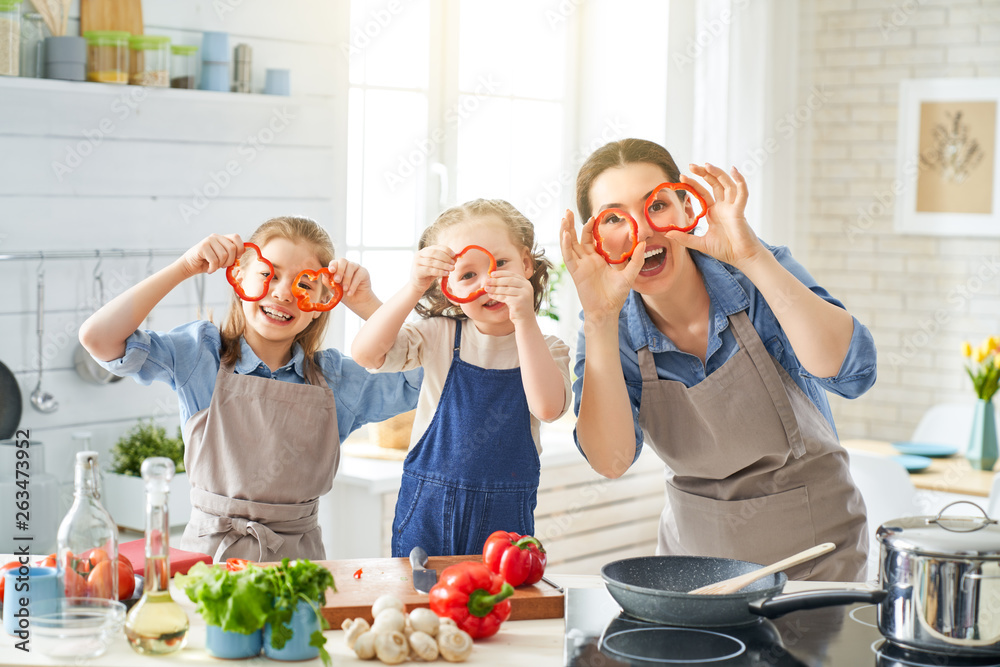Happy family in the kitchen. Happy family in the kitchen.