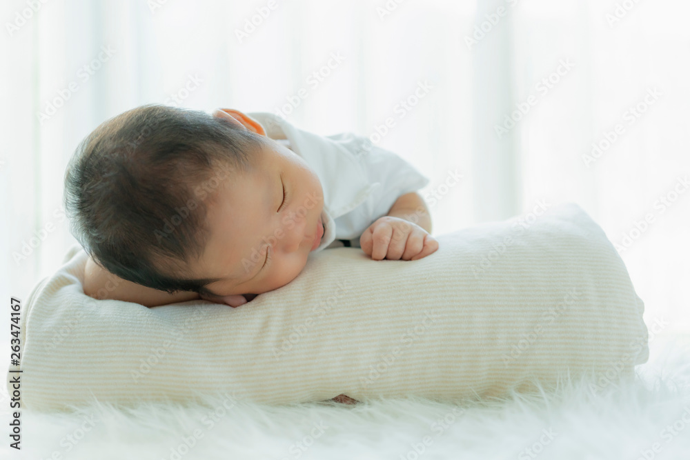 cute infant baby boy sleep with sweet dream and peaceful white soft bed cute infant baby boy sleep with sweet dream and peaceful white soft bed