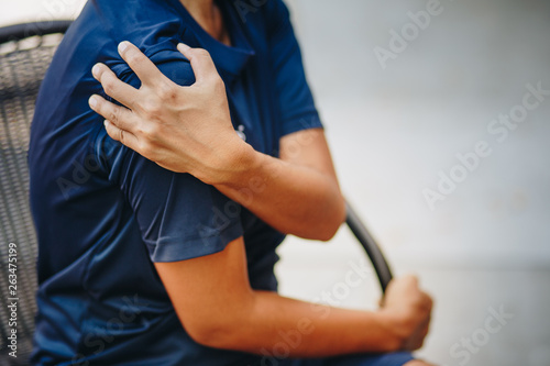 young woman with pain in shoulder, Ache in human body , office syndrome , health care concept