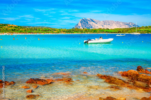 Fototapeta Naklejka Na Ścianę i Meble -  View of Cala Brandinchi most famous beach of Sardinia Island, Italy. Famous places and travel destination of Sardinia, Italy. Summer holidays on the white sandy beaches of Sardinia. Beach of Sardinia