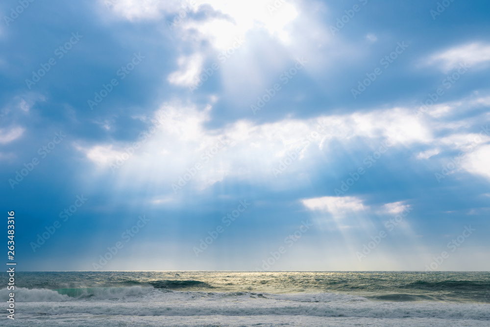 Big sea waves, big storm, weather elements on background of blue sky