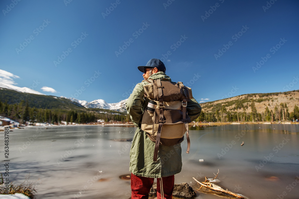 Obraz premium Hiker in Rocky mountains National park in USA