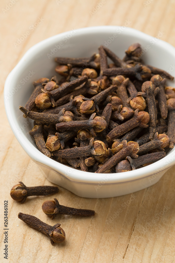 Bowl with dried cloves Bowl with dried cloves
