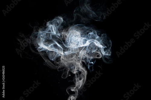 close up of steam smoke powder isolated on black background