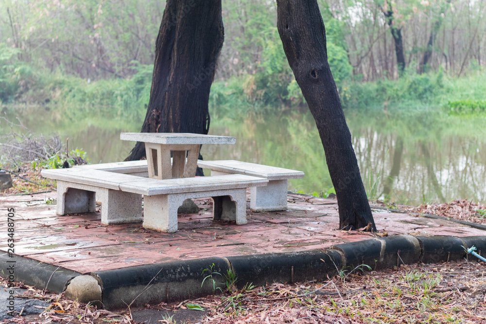 outdoor marble table set near pond at Thailand outdoor marble table set near pond at Thailand