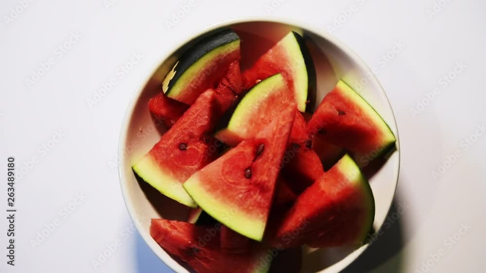 Watermelon / tarbooj fruit cube slices served in a bowl. selective focus Watermelon / tarbooj fruit cube slices served in a bowl. selective focus