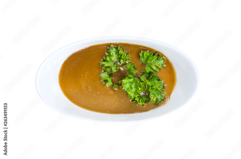 Brown sauce in a small plate with parcley isolated on white. Top view. With clipping path Brown sauce in a small plate with parcley isolated on white. Top view. With clipping path