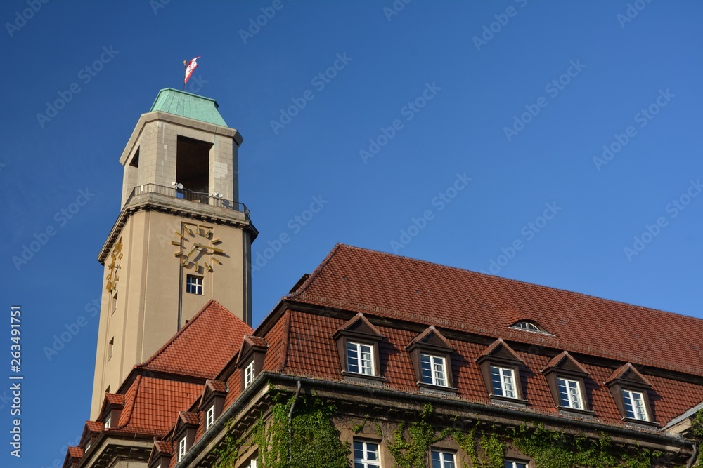 Evening close-up view of the famous Town Hall Spandau (Rathaus Spandau) in beautiful golden light on August 9, 2015, Berlin, Germany