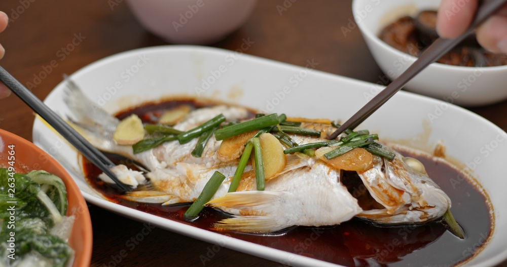 Steamed fish on dish, chinese cuisine Steamed fish on dish, chinese cuisine