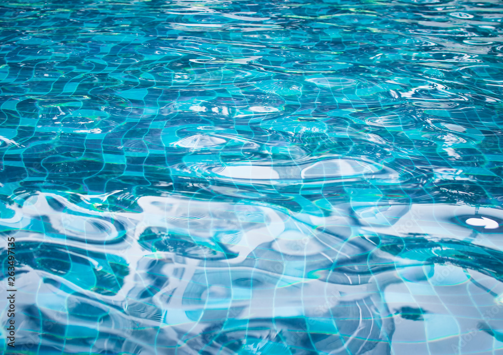 Background of rippled water in swimming pool. Abstract background.