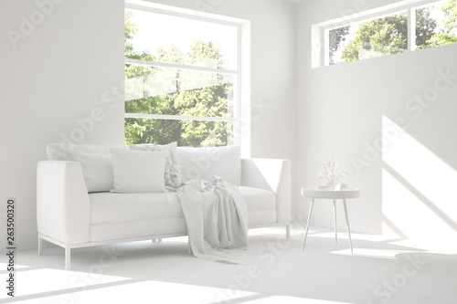 Stylish room in white color with sofa and green landscape in window. Scandinavian interior design. 3D illustration © AntonSh